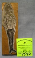 Early metal and wood figural policeman printing pl