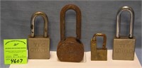 Group of four vintage heavy duty pad locks