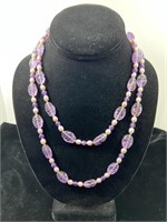 Carved amethyst with pearl necklace, silver clasp