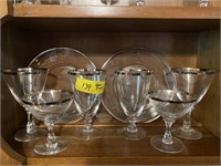 16 pc glass set with silver rim