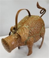 Tin pig watering can