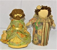 2 VINTAGE HAND MADE AND PAINTED LADIES DOOR STOPS