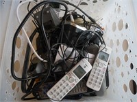 Cordless Phones & Remotes in Plastic Crate
