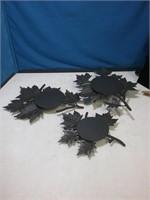 Group of three iron branch candle stands