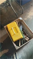 Wooden crate with empty tool box, coat hanger and