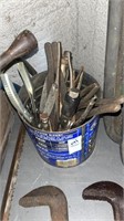 Coffee can of pliers and other