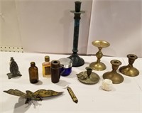 Brass candle holders, perfume bottles, brass