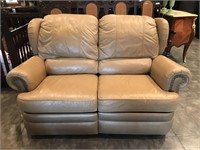 TAN LOVE SEAT- PLEATHER, BOTH SIDES RECLINE- HAS