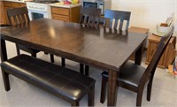Dining room table with leaf bench and 4 chairs
