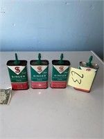 Singer sewing oil cans