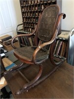 Child's Rocking Chair with Cane Back and Seat