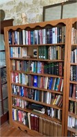 Large wooden bookcase with contents of