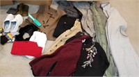 Boxes of clothing, some new, robes, shirts,