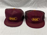 2 Northrup King hats