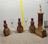 Bottles &baseball trophy