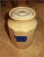 yellow stoneware paneled jar marked "S" has chip