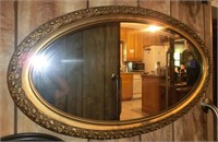 lg oval gold leaf framed mirror