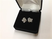 14k white gold Diamond Pierced Earrings in swirl