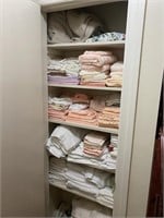 5 shelves of towels and cloths