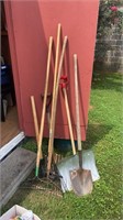 3 rakes, 3 shovels and 1 pick axe