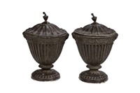 PAIR OF ANTIQUE LEAD COVERED GARDEN URNS