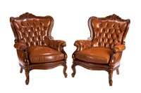 PAIR OF TUFTED LEATHER UPHOLSTERED CHAIRS