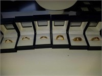 Six gold-plated Rings including spinner rings