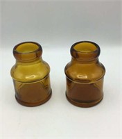 Two vintage amber 5 inch jars
