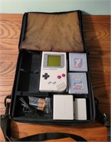 Nintendo Gameboy. Includes case, cord, light,