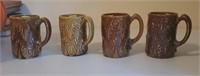 Four brown mugs