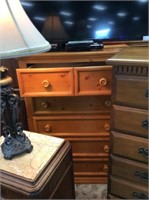 Five drawer light wood dresser
