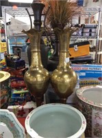 Set of two tall brass vases