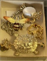 Assortment of pins jewelry