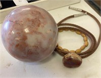Large stone sphere and agate necklace