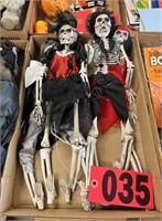 (4) Small Halloween skeletons