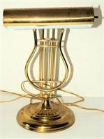 Lot #3325 - Figural brass lyre piano lamp 15”