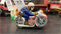 Motorcycle Cop windup toy
