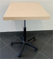 Adjustable Table on Castors