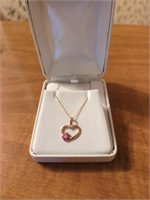 14k gold necklace with ruby charm