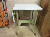 Green 1940's metal typing stand (basement)