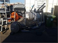 Elliptical trainer techno gym stored outside