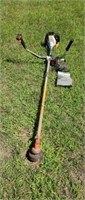 Stihl FS 86 gas powered weed trimmer with extra
