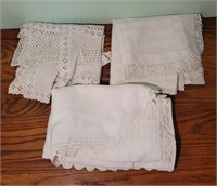 Lace table clothes. 36x36, 36x36 and 60x48.