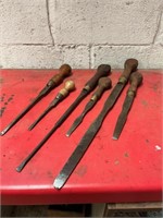 Six Antique screw drivers with wooden handles.