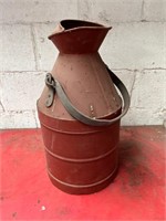 Antique metal oil churn with handle.