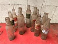 Collection of Vintage oil bottles.
