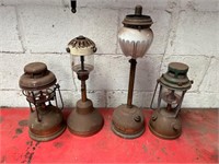 Antique brass Tilley lamps.