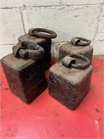 Four Antique weights.