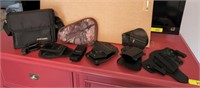 TRAY OF HOLSTERS,MISC