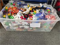 LARGE BIN OF CHRISTMAS REDEMPTION ITEMS.